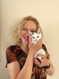 Wit kitten Beamer en ik